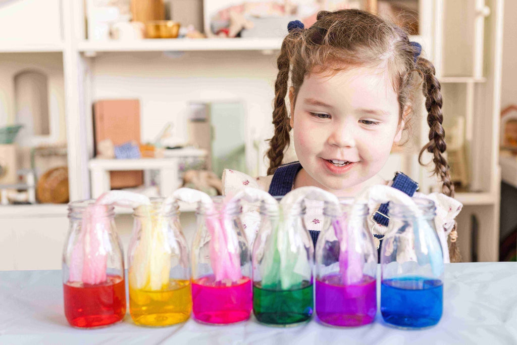 kid using a science kit to do simple science experiments at home